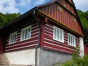 Obroušení, vyspravení spár, nátěr dřevěného opláštění