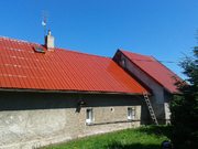 Nátěr střechy z pozinkových šablon